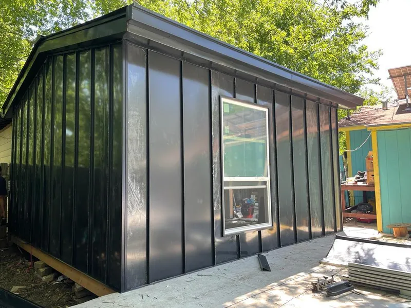 Black standing seam metal wall panels for Metal Roof Installation in Daleville